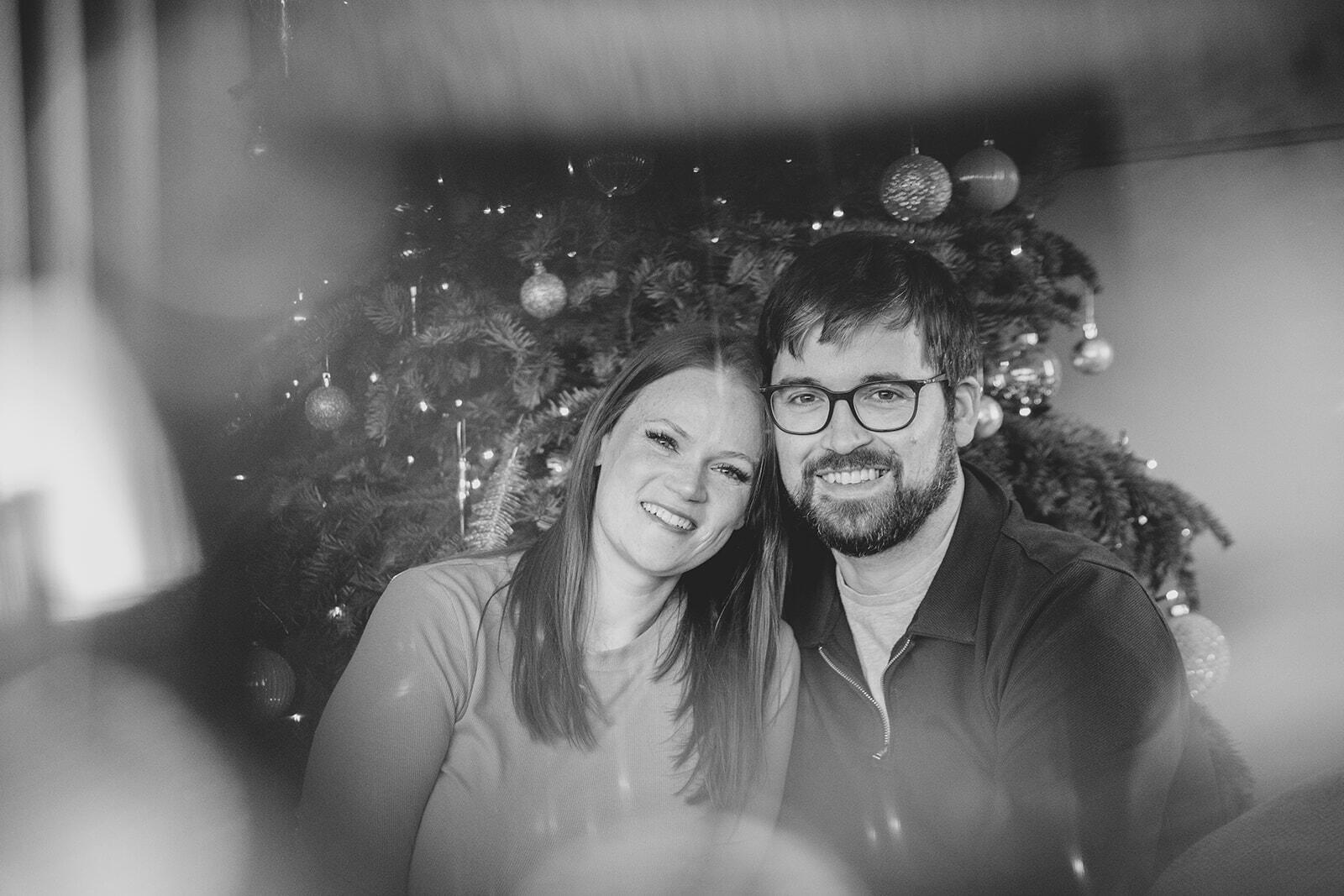 Detail of Christmas tree hanger being put up during a Lincoln family photography session